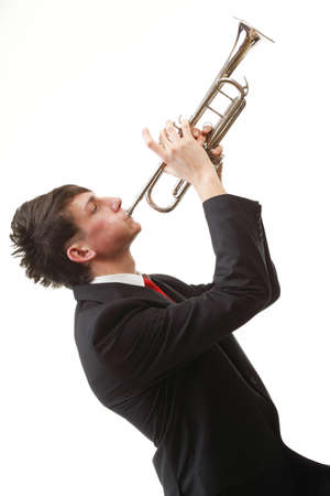 16237637-portrait-of-a-young-jazz-man-playing-his-trumpet-white-background.jpg